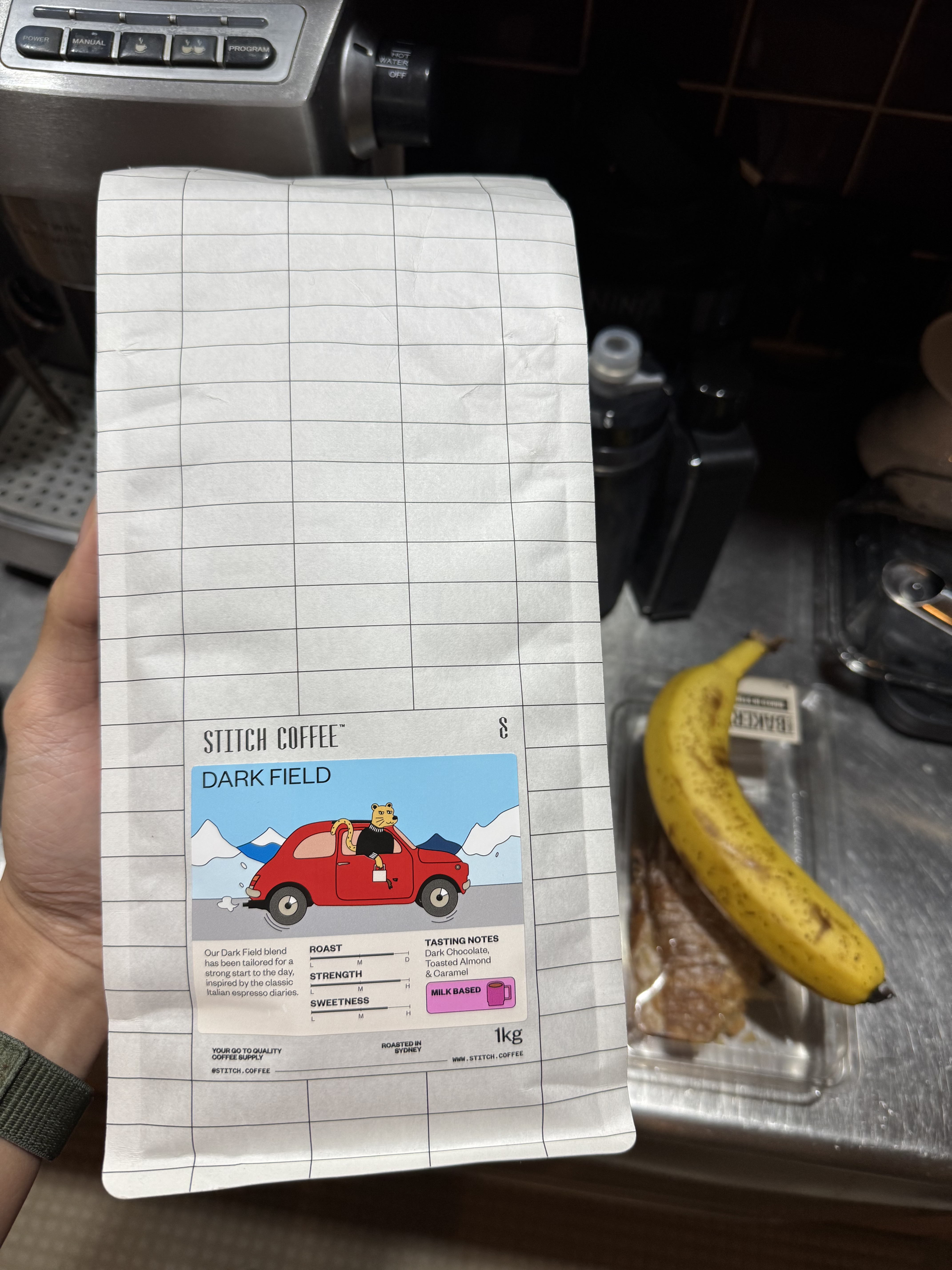 My first 1 kg coffee beans. I’ve never hold this much coffee in one hand before. Taken at 2025-12-06.