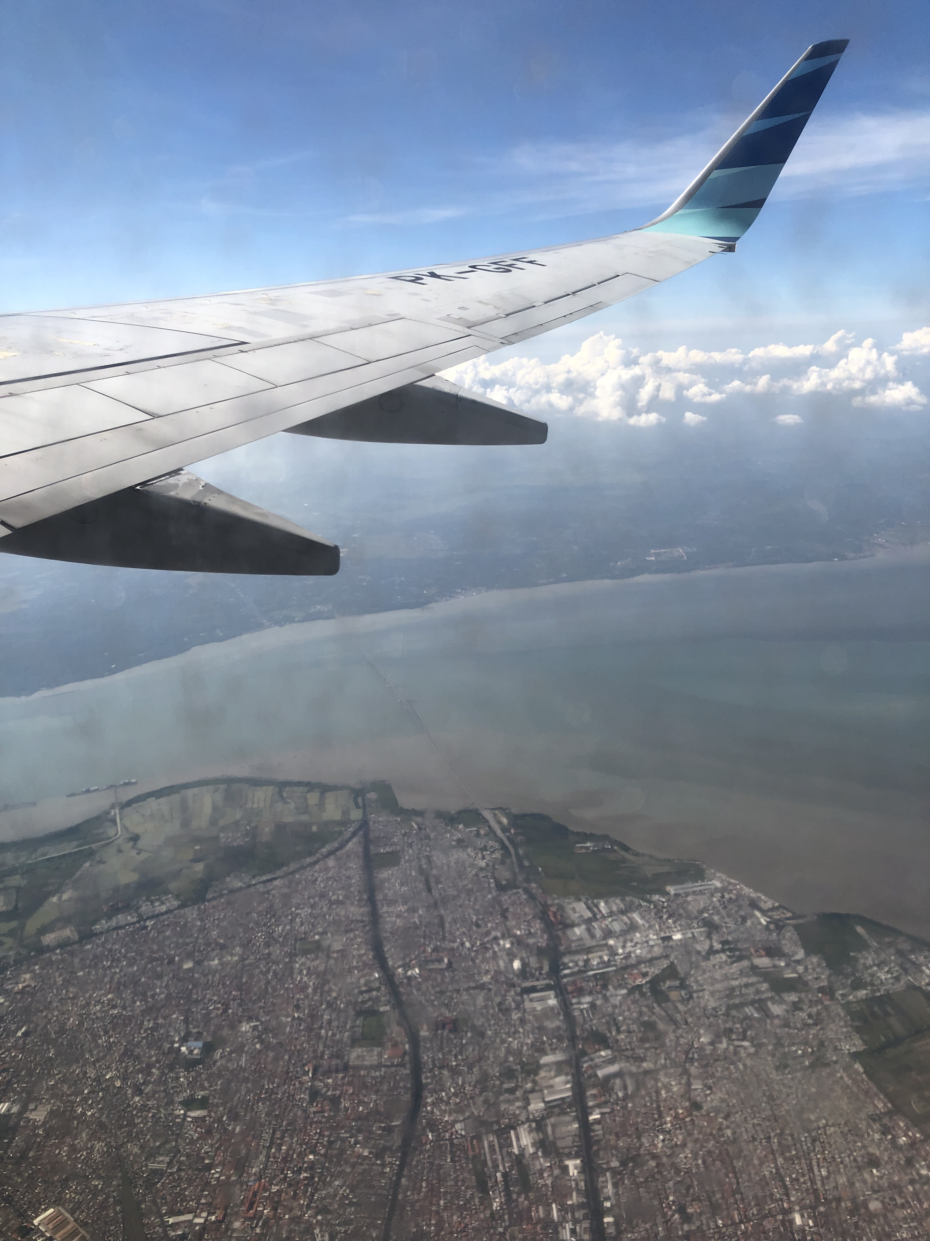 I can see Madura island and Suramadu bridge from the plane. (Yes the window is dirty, I can’t wipe it from my side.)